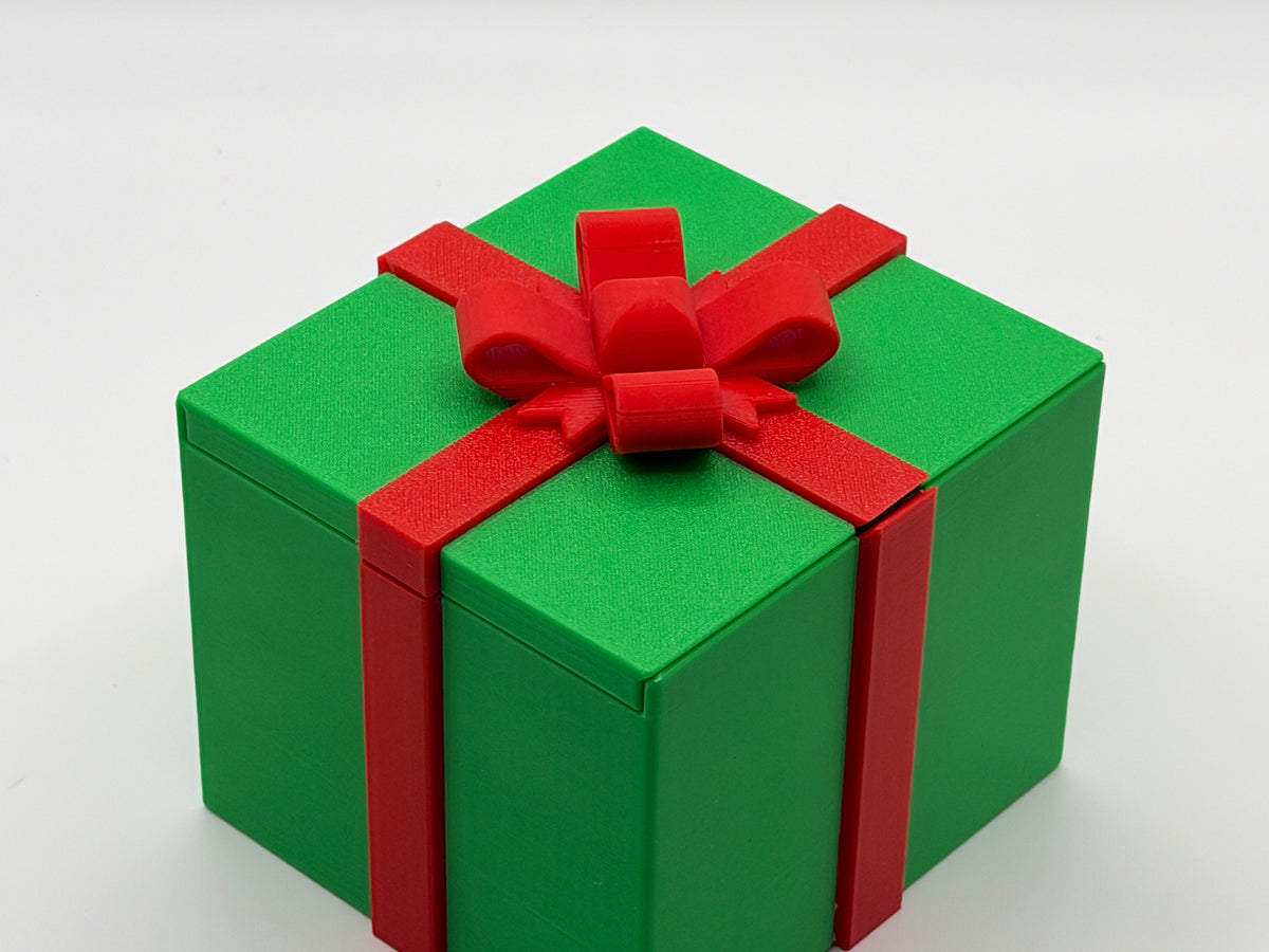 Pointy finger gift box – green box, red bow