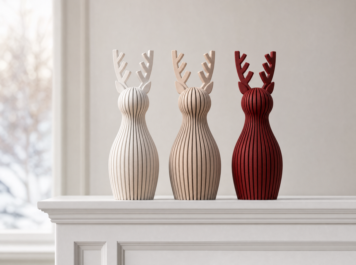 Three reindeer figurines on a white mantelpiece