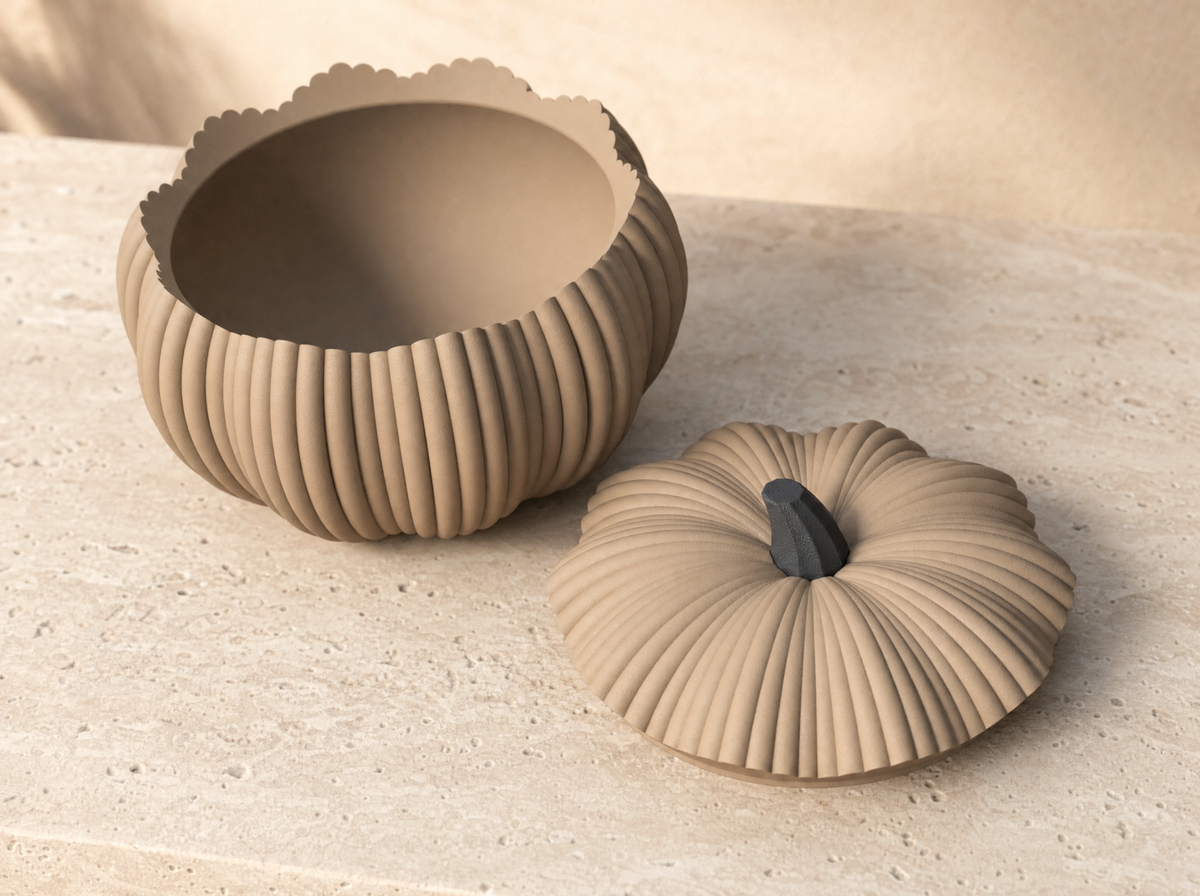 Dark tan pumpkin bowl open with lid beside it
