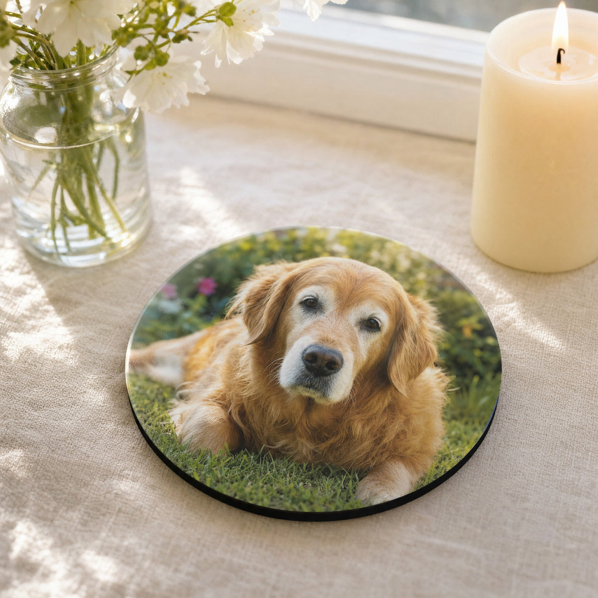 Pet memorial photo coaster with a candle